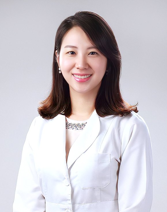 Dr. Su Jung Yoon in clinic coat